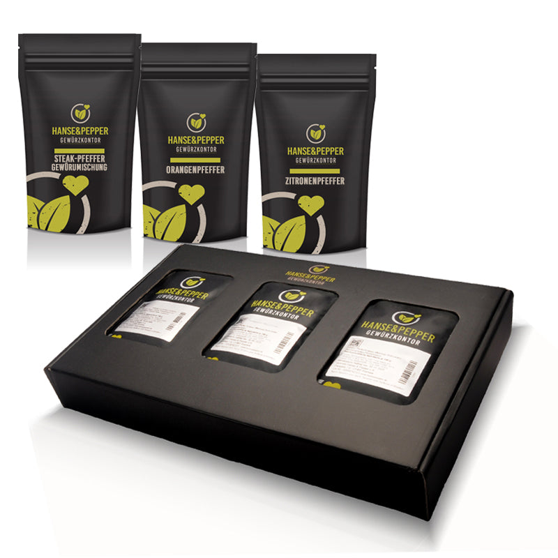 Geschenkbox mit Produkttüten, gefüllt mit Steak-Pfeffer, Orangenpfeffer und Zitronenpfeffer.
